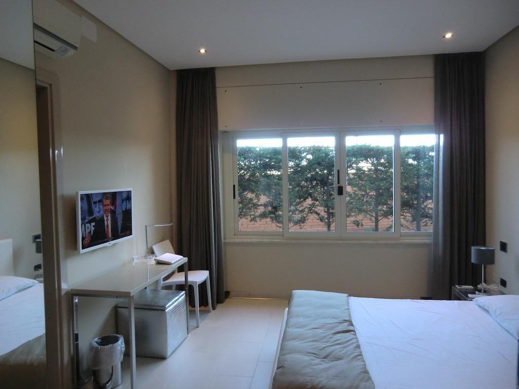 B&Beach Cagliari Guest House Стая снимка